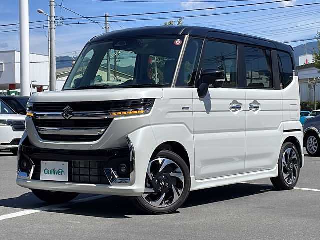 スズキ スペーシア カスタム HYBRID XS ターボ 長野県 2023(令5)年 0.1千km ピュアホワイトパール/ブラック2トーン ターボ/純正メモリナビ/（フルセグTV/AM/FM/BT）/全方位モニター/HDMI/純正前後ドラレコ/シートヒーター/ステアリングヒーター/スズキセーフティサポート/レーダークルーズコントロール/レーンキープアシスト/ブレーキホールド/2列目オットマン/両側パワースライドドア/エアバック（W＋サイド）/純正15インチアルミホイール/アイドリングストップ/横滑り防止機能/ヘッドアップディスプレイ/純正LEDヘッドライト/フォグランプ/パドルシフト/サンシェード/ウィンカーミラー/ルーフブラックツートンカラー