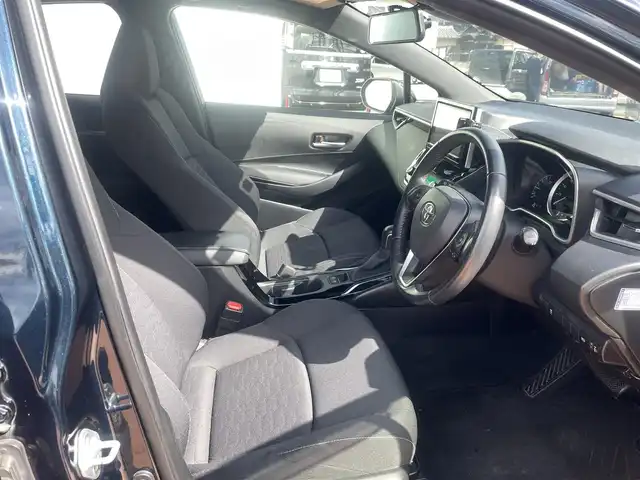 トヨタ カローラ スポーツ ハイブリッドG 三重県 2019(令1)年 6.7万km ブラッキッシュアゲハガラスフレーク 純正9インチメモリナビ（NSZT-Y68T)/　＊フルセグテレビ/Bluetooth/FM/AM/バックカメラ/セーフティセンス/3灯式LEDヘッドランプ/オートライト/ボディ同色電動格納ドアミラー/205/55R16タイヤ/　＊16インチアルミホイール/革巻きステアリングホイール/左右独立温度調整オートエアコン/ブラックファブリックシート/スポーツシート/スマートエントリー/プッシュスタート