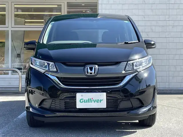 ホンダ フリード G ホンダセンシング 岐阜県 2019(令1)年 0.7万km プレミアムスパークルブラックパール ワンオーナー/4WD/社外SDナビ/【Bluetooth．CD.DVD.AM/FM．TV.AUX】/両側パワースライドドア/衝突軽減ブレーキ/レーンキープアシスト/バックカメラ/クルーズコントロール/シートヒーター/スマートキー/LEDヘッドライト・オート機能付き/ウォークスルー/ETC/ドライブレコーダー/純正フロアマット/ドアバイザー/ウィンカーミラー/アイドリングストップ/スペアキー/保証書/取扱説明書