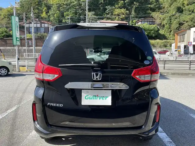 ホンダ フリード G ホンダセンシング 岐阜県 2019(令1)年 0.7万km プレミアムスパークルブラックパール ワンオーナー/4WD/社外SDナビ/【Bluetooth．CD.DVD.AM/FM．TV.AUX】/両側パワースライドドア/衝突軽減ブレーキ/レーンキープアシスト/バックカメラ/クルーズコントロール/シートヒーター/スマートキー/LEDヘッドライト・オート機能付き/ウォークスルー/ETC/ドライブレコーダー/純正フロアマット/ドアバイザー/ウィンカーミラー/アイドリングストップ/スペアキー/保証書/取扱説明書