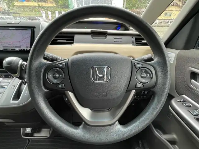 ホンダ フリード G ホンダセンシング 岐阜県 2019(令1)年 0.7万km プレミアムスパークルブラックパール ワンオーナー/4WD/社外SDナビ/【Bluetooth．CD.DVD.AM/FM．TV.AUX】/両側パワースライドドア/衝突軽減ブレーキ/レーンキープアシスト/バックカメラ/クルーズコントロール/シートヒーター/スマートキー/LEDヘッドライト・オート機能付き/ウォークスルー/ETC/ドライブレコーダー/純正フロアマット/ドアバイザー/ウィンカーミラー/アイドリングストップ/スペアキー/保証書/取扱説明書