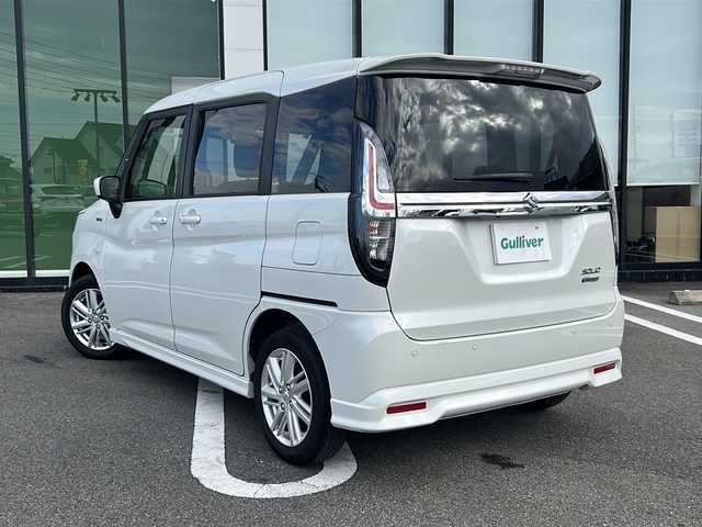 スズキ ソリオ HV MX 岐阜県 2022(令4)年 4.3万km コルドバレッド 登録時走行距離42295km/社外ナビ/バックモニター/Blue tooth・CD・DVD・SDミュージックサーバー・USB入力端子/ETC/片側パワースライドドア/デュアルセンサーブレーキサポートII/誤発進抑制機能/発進お知らせ機能［先行車・信号切り替わり］/コーナーセンサー後方/レーダークルーズコントロール/レーンキープアシスト/純正15アルミホイール/布系シート/フルフラットシート/シートヒーター前席/プッシュスタート/スマートキー/アイドリングストップ/オートマチックハイビーム/オートライト