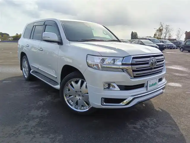 トヨタ ランドクルーザー ZX 群馬県 2016(平28)年 5.2万km ホワイトパールクリスタルシャイン 4WD/ムーンルーフ/純正9型MOPナビ/フルセグTV/純正OP後席左右ディスプレイ/マルチテレインモニター/ビルトインETC2.0/前後ドライブレコーダー/レーダークルーズコントロール/セーフティセンスP/・衝突被害軽減ブレーキ/・車線逸脱警報/・オートマチックハイビーム/ブラインドスポットモニター/LEDヘッドランプ/デュアルオートエアコン/木目調/革巻きコンビステアリング/ステアリングヒーター/ブラックナッパ革シート/前席パワーシート/ベンチレーション/前席・2列目シートヒーター/社外22インチアルミホイール/スマートキー/プッシュエンジンスタート/禁煙車