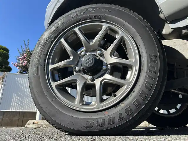 スズキ ジムニー XC 東京都 2021(令3)年 5.4万km ミディアムグレー ワンオーナー/純正OP8インチナビ（CN-RZ866）/・Bluetoothオーディオ/USBオーディオ/・フルセグTV/DVD/バックカメラ/セーフティサポート/クルーズコントロール/LEDヘッドランプ/オートライト/シートヒーター（前席）/ビルトインETC/取扱説明書/保証書/スペアキー1本