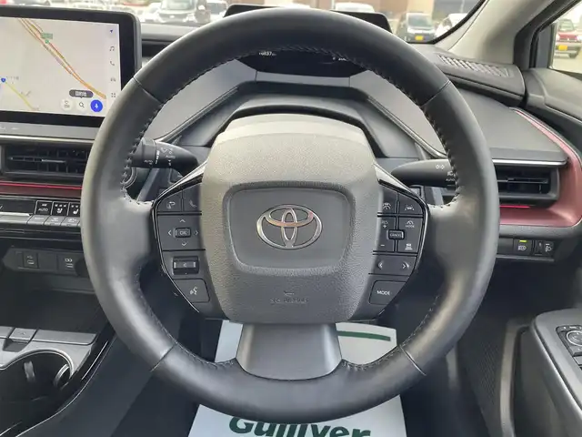 トヨタ プリウス Z 兵庫県 2024(令6)年 1.7万km グレー 純正１２．３インチディスプレイオーディオ/追従クルコン/前方ドラレコ/１９インチＡＷ/デジタルインナミラー/パノラマビュー/パワーバックドア　/ＢＴ/ＴｙｐｅＣ接続/レザー/オートハイビーム/ビルトインETC2.0/フルセグ/AC100V/D+N席シートヒーター/エアシート/ステアリングヒーター/ヘッドライトレベロイザ/ワイヤレス充電