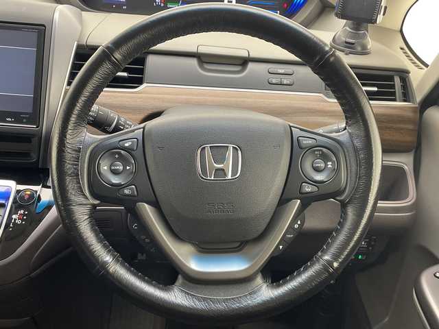 ホンダ フリード ハイブリット G ホンダセンシング 愛知県 2017(平29)年 6.5万km ホワイトオーキッドパール ホンダセンシング/両側パワースライドドア/純正9型ナビ　SDカードなし/バックカメラ/レーダークルーズコントロール/ETC/ドライブレコーダー/衝突軽減システム/フルセグ/CD DVD/Bluetooth/ステアリングスイッチ/スマートキー/プッシュスタート