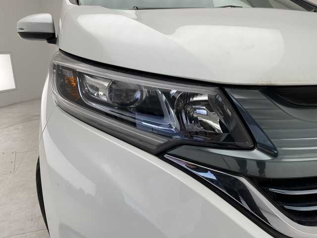 ホンダ フリード ハイブリット G ホンダセンシング 愛知県 2017(平29)年 6.5万km ホワイトオーキッドパール ホンダセンシング/両側パワースライドドア/純正9型ナビ　SDカードなし/バックカメラ/レーダークルーズコントロール/ETC/ドライブレコーダー/衝突軽減システム/フルセグ/CD DVD/Bluetooth/ステアリングスイッチ/スマートキー/プッシュスタート