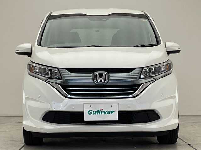 ホンダ フリード ハイブリット G ホンダセンシング 愛知県 2017(平29)年 6.5万km ホワイトオーキッドパール ホンダセンシング/両側パワースライドドア/純正9型ナビ　SDカードなし/バックカメラ/レーダークルーズコントロール/ETC/ドライブレコーダー/衝突軽減システム/フルセグ/CD DVD/Bluetooth/ステアリングスイッチ/スマートキー/プッシュスタート