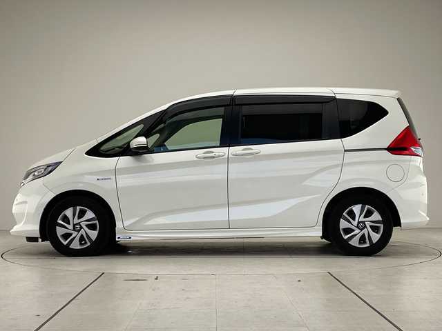 ホンダ フリード ハイブリット G ホンダセンシング 愛知県 2017(平29)年 6.5万km ホワイトオーキッドパール ホンダセンシング/両側パワースライドドア/純正9型ナビ　SDカードなし/バックカメラ/レーダークルーズコントロール/ETC/ドライブレコーダー/衝突軽減システム/フルセグ/CD DVD/Bluetooth/ステアリングスイッチ/スマートキー/プッシュスタート