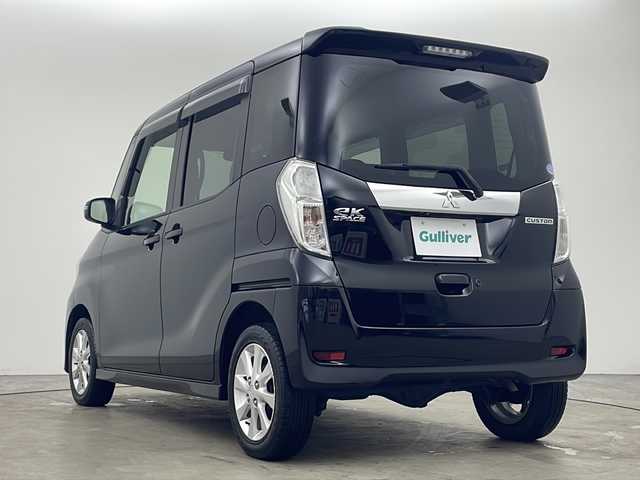 三菱 ｅＫスペース カスタムG 秋田県 2014(平26)年 6.6万km アメジストブラック 4WD/KENWOODメモリナビ　/　　CD/DVD/BT/フルセグTV/バックカメラ　/両側パワースライドドア　/HIDヘッドライト　/フォグランプ　/シートヒーター　/純正14インチアルミホイール　/アイドリングストップ　/横滑り防止装置　/リアサンシェード/オートエアコン/スマートキー