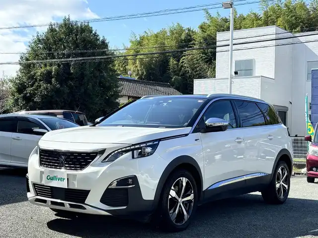 プジョー ５００８ GT ブルーHDi 熊本県 2019(令1)年 6.4万km BLANC NACRE ディスプレイオーディオ/【AppleCarPlay/AndroidAuto/Bluetooth/USB】/バックカメラ/サイドカメラ/アクティブセーフティブレーキ/レーンキープアシスト/コーナーセンサー/ブラインドスポットモニター/インテリジェントハイビーム/アダプティブクルーズコントロール/ハーフレザーシート/ステアリングリモコン/パドルシフト/パワーバックドア/ETC/電子パーキング/前後ドライブレコーダー/置くだけ充電/LEDオートライト