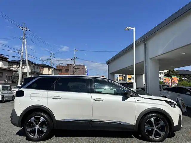 プジョー ５００８ GT ブルーHDi 熊本県 2019(令1)年 6.4万km BLANC NACRE ディスプレイオーディオ/【AppleCarPlay/AndroidAuto/Bluetooth/USB】/バックカメラ/サイドカメラ/アクティブセーフティブレーキ/レーンキープアシスト/コーナーセンサー/ブラインドスポットモニター/インテリジェントハイビーム/アダプティブクルーズコントロール/ハーフレザーシート/ステアリングリモコン/パドルシフト/パワーバックドア/ETC/電子パーキング/前後ドライブレコーダー/置くだけ充電/LEDオートライト