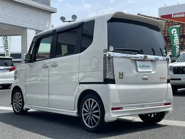 ホンダ Ｎ ＢＯＸ カスタム G ターボ Lパッケージ 岡山県 2016(平28)年 4.8万km プレミアムホワイトパールⅡ 登録時走行距離47908km/社外８インチメモリナビ/(AM/FM/DISC/TV/BT)/衝突被害軽減システム/両側パワースライドドア/アイドリングストップ/バックカメラ/ドライブレコーダー/ビルトインETC/パドルシフト/クルーズコントロール/スペアキー×1/スマートキー/プッシュスタート/純正15インチアルミホイール