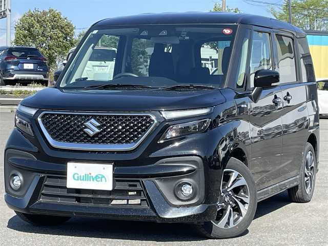 スズキ ソリオ バンディット HV MV 道央・札幌 2024(令6)年 2.1万km スーパーブラックパール ４WD/社外メモリーナビ/AM/FM/BT/デュアルカメラブレーキサポート/横滑り防止装置/レーダークルーズコントロール/レーンキープアシスト/リヤパーキングセンサー/バックカメラ/ETC/ドライブレコーダー/アイドリングストップ/HUD/両側パワースライドドア/前席シートヒーター/革巻きステアリング/ステアリングリモコン/プッシュスタート/スマートキー/LEDヘッドライト/オートライト/オートハイビーム/フォグランプ/電動格納ミラー/ヒーテッドドアミラー/ウィンカーミラー/フロアマット/スペアキー/レンタカー登録