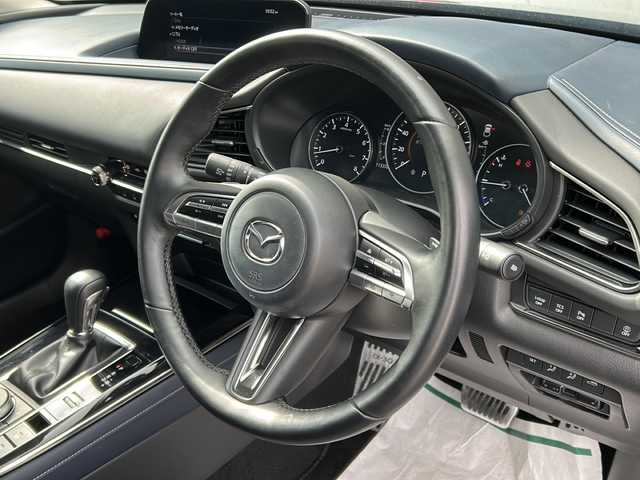 マツダ ＣＸ－３０ 20S プロアクティブツーリングセレ 富山県 2021(令3)年 1.2万km ポリメタルグレーM 禁煙車/純正ＳＤディスプレイオーディオナビ/バックカメラ/フルセグＴＶ/レーダークルーズコントロール/レーンキープアシスト/衝突軽減ブレーキ/コーナーセンサー/電動リアゲート/アイドリングストップ/MTモード付AT/純正アルミホイール/社外フロアマット/ドライブレコーダー/ＥＴＣ/スマートキー/スペアキー