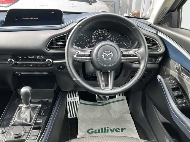 マツダ ＣＸ－３０ 20S プロアクティブツーリングセレ 富山県 2021(令3)年 1.2万km ポリメタルグレーM 禁煙車/純正ＳＤディスプレイオーディオナビ/バックカメラ/フルセグＴＶ/レーダークルーズコントロール/レーンキープアシスト/衝突軽減ブレーキ/コーナーセンサー/電動リアゲート/アイドリングストップ/MTモード付AT/純正アルミホイール/社外フロアマット/ドライブレコーダー/ＥＴＣ/スマートキー/スペアキー