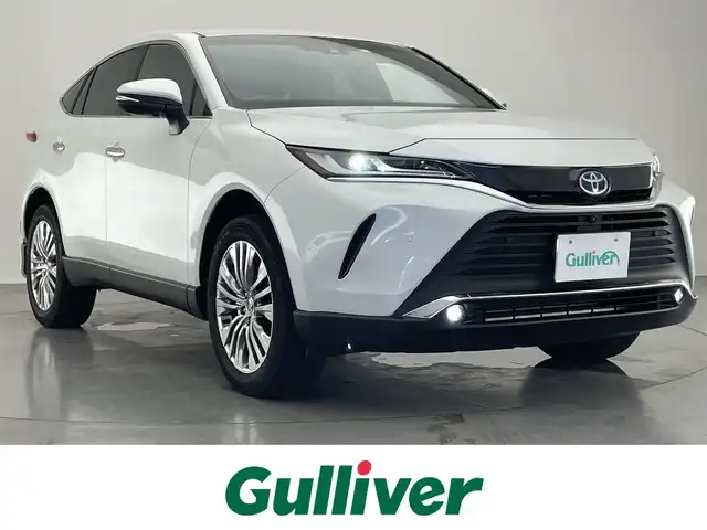 トヨタ ハリアー ハイブリッド Z レザーパッケージ 愛知県 2023(令5)年 2.4万km プラチナホワイトパールマイカ 純正１２．３型ＤＡナビ　フルセグＴＶ　ＪＢＬサウンド　モデリスタエアロ４本出マフラー　全方位カメラ　デジタルインナーミラー録画付き　黒革　シートヒーター　衝突軽減　追従クルコン　ＢＳＭ　ＬＥＤオートライト　パワーシート　シートベンチレーショーン　電動リアゲート　ETC　内臓型前後ドラレコ　禁煙車