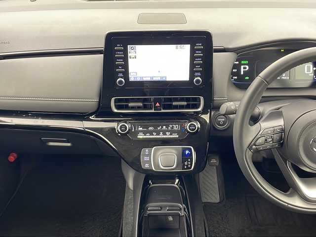 トヨタ アクア G 秋田県 2024(令6)年 2万km プラチナホワイトパールマイカ 4WD/純正ナビ/AM/FM/Bluetooth　/バックカメラ　/衝突被害軽減ブレーキ　/レーダークルーズコントロール　/横滑り防止装置/レーンキープアシスト/寒冷地仕様　/LEDライト　/バックカメラ　/ＥＴＣ　/前後コーナーセンサー　/スマートキー/ワイパーデアイサー/革巻きステアリング/AC100V/ミラーヒーター/ドライブレコーダー