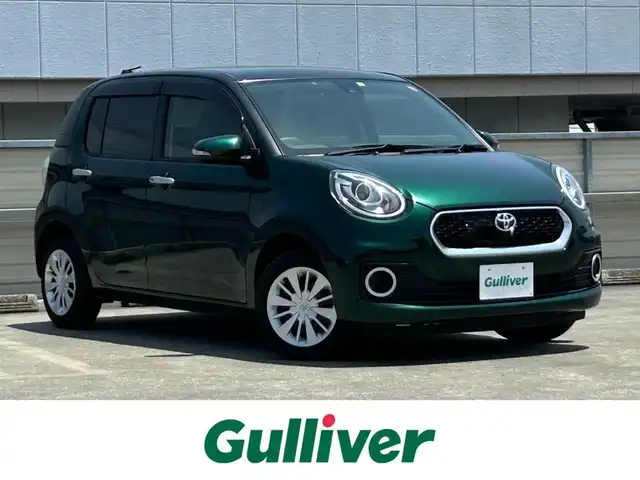 トヨタ パッソ モーダ　S 静岡県 2018(平30)年 2.4万km ブラックマイカメタリック/ダークエメラルドマイカ 2トーン プッシュスタート/社外メモリナビ（AM/FM/CD/DVD/TV/Bluetooth）/バックカメラ/ETC/横滑り防止装置/オートライト/アイドリングストップ/AAC/コーナーセンサー