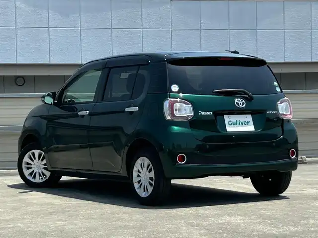 トヨタ パッソ モーダ　S 静岡県 2018(平30)年 2.4万km ブラックマイカメタリック/ダークエメラルドマイカ 2トーン プッシュスタート/社外メモリナビ（AM/FM/CD/DVD/TV/Bluetooth）/バックカメラ/ETC/横滑り防止装置/オートライト/アイドリングストップ/AAC/コーナーセンサー