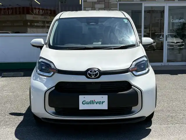 トヨタ シエンタ Z 徳島県 2023(令5)年 1.4万km ホワイトパールクリスタルシャイン メーカー10.5型ナビ/（ラジオ/BT/USB/フルセグ）/純正フリップダウンモニター/バックカメラ/全方位カメラ/両側電動スライドドア/ビルトインETC/前後ドライブレコーダー/コーナーセンサー/ブラインドスポットモニター/PKSB/DRIVEMODE/追従式クルーズコントロール/LEDヘッドライト/新車時保証書