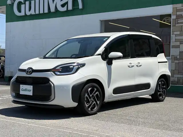 トヨタ シエンタ Z 徳島県 2023(令5)年 1.4万km ホワイトパールクリスタルシャイン メーカー10.5型ナビ/（ラジオ/BT/USB/フルセグ）/純正フリップダウンモニター/バックカメラ/全方位カメラ/両側電動スライドドア/ビルトインETC/前後ドライブレコーダー/コーナーセンサー/ブラインドスポットモニター/PKSB/DRIVEMODE/追従式クルーズコントロール/LEDヘッドライト/新車時保証書