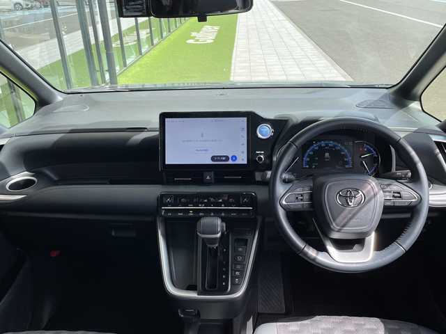 トヨタ ヴォクシー ハイブリッド S－Z 愛知県 2022(令4)年 3.1万km スパークリングブラックパールクリスタルシャイン トヨタセーフティセンス/純正10.5型ディズプレイオーディオナビ/フリップダウンモニター/両側パワースライドドア/レーダークルーズコントロール/シートヒーター/バックカメラ/コーナーセンサー/純正アルミホイール/ETC2.0/LEDヘッドライト/オートマチックハイビーム/ドライブレコーダー/衝突軽減システム/フルセグ/CD DVD/Bluetooth/ステアリングスイッチ/スマートキー/プッシュスタート