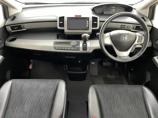 ホンダ フリード ハイブリット ジャストセレクション 福島県 2012(平24)年 15.9万km プレミアムブラキッシュパール 純正ナビ/・型番；VXM-122VFi/・フルセグ/TV/BT/SD/USB/CD/DVD/iPod/AM/FM/バックカメラ/両側パワースライドドア/ハーフレザーシート/クルーズコントロール/オートライト/ETC/社外アルミホイール付きスタッドレスタイヤ/・積み込み純正アルミホイール付きサマータイヤ（185/65/15）/電動格納ミラー/・ウィンカーミラー/純正フロアマット/プッシュスタート/・スマートキー