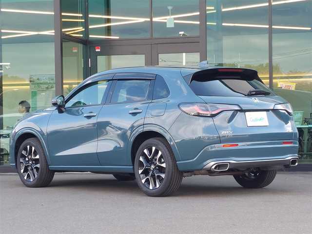 ホンダ ＺＲ－Ｖ ハイブリッド e:HEV Z 東京都 2024(令6)年 0.3万km 緑 純正ナビ/マルチビューカメラシステム/ドライブレコーダー/ビルトインETC/BOSEプレミアムサウンドシステム/レザーシート/パワーシート/シートヒーター/ステアリングヒーター/パドルシフト/Honda　SENSING/・衝突軽減ブレーキ/・誤発進抑制機能/・路外逸脱抑制機能/・アダプティブクルーズコントロール/・車線維持支援システム/・ブラインドスポットモニター