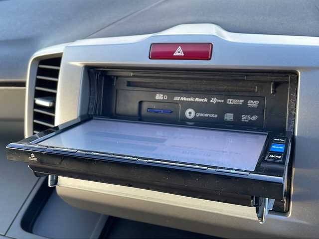 ホンダ フリード G プレミアムエディション 徳島県 2016(平28)年 4.1万km ホワイトオーキッドパール 純正7インチSDナビ/（Bluetooth/フルセグ/CD/DVD）/バックカメラ/純正フリップダウンモニター/両側パワースライドドア/クルーズコントロール/黒半革シート/HIDヘッドライト/オートライト/ビルトインETC/純正フロアマット/電格ミラー/ドアバイザー/スマートキー