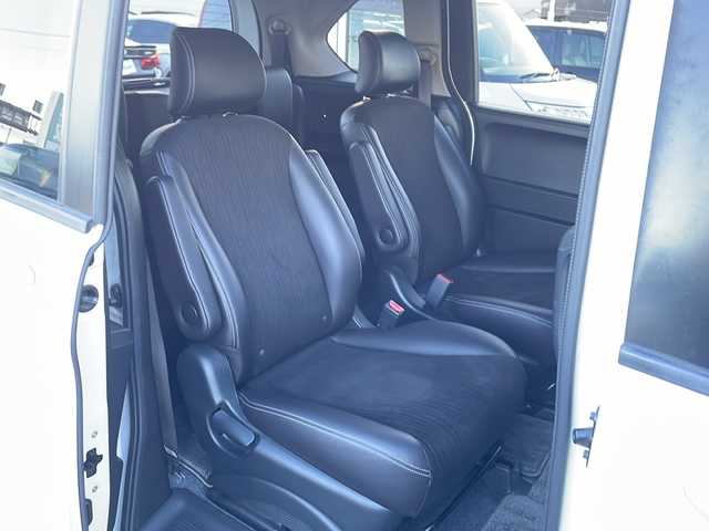 ホンダ フリード G プレミアムエディション 徳島県 2016(平28)年 4.1万km ホワイトオーキッドパール 純正7インチSDナビ/（Bluetooth/フルセグ/CD/DVD）/バックカメラ/純正フリップダウンモニター/両側パワースライドドア/クルーズコントロール/黒半革シート/HIDヘッドライト/オートライト/ビルトインETC/純正フロアマット/電格ミラー/ドアバイザー/スマートキー