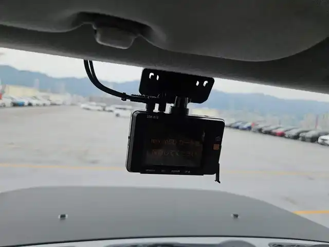 トヨタ ＦＪクルーザー 富山県 2012(平24)年 4.5万km セメントグレーM/ホワイト 〇ルーフレール/〇TRDスキッドプレート/〇TRUSTマフラー/〇4×4エンジニアリングショックアブソーバー/〇リフトアップ/〇社外9インチナビ/〇フルセグTV/〇背面タイヤ/〇リアラダー/〇ドライブレコーダー/〇純正17インチスチールホイール/〇マニュアルエアコン/〇ブラック撥水/防水ファブリックシート/〇リモコンキー/〇禁煙車