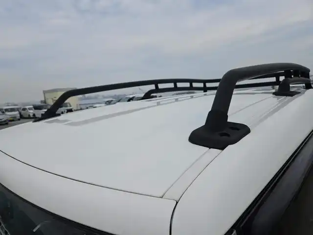 トヨタ ＦＪクルーザー 富山県 2012(平24)年 4.5万km セメントグレーM/ホワイト 〇ルーフレール/〇TRDスキッドプレート/〇TRUSTマフラー/〇4×4エンジニアリングショックアブソーバー/〇リフトアップ/〇社外9インチナビ/〇フルセグTV/〇背面タイヤ/〇リアラダー/〇ドライブレコーダー/〇純正17インチスチールホイール/〇マニュアルエアコン/〇ブラック撥水/防水ファブリックシート/〇リモコンキー/〇禁煙車