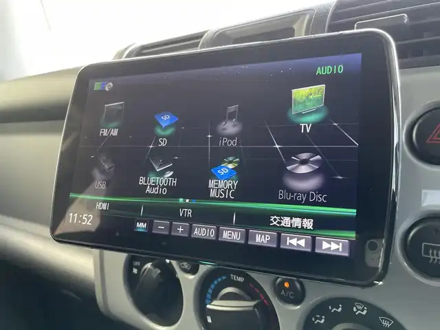 トヨタ ＦＪクルーザー 富山県 2012(平24)年 4.5万km セメントグレーM/ホワイト 〇ルーフレール/〇TRDスキッドプレート/〇TRUSTマフラー/〇4×4エンジニアリングショックアブソーバー/〇リフトアップ/〇社外9インチナビ/〇フルセグTV/〇背面タイヤ/〇リアラダー/〇ドライブレコーダー/〇純正17インチスチールホイール/〇マニュアルエアコン/〇ブラック撥水/防水ファブリックシート/〇リモコンキー/〇禁煙車