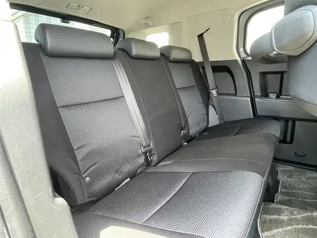 トヨタ ＦＪクルーザー 富山県 2012(平24)年 4.5万km セメントグレーM/ホワイト 〇ルーフレール/〇TRDスキッドプレート/〇TRUSTマフラー/〇4×4エンジニアリングショックアブソーバー/〇リフトアップ/〇社外9インチナビ/〇フルセグTV/〇背面タイヤ/〇リアラダー/〇ドライブレコーダー/〇純正17インチスチールホイール/〇マニュアルエアコン/〇ブラック撥水/防水ファブリックシート/〇リモコンキー/〇禁煙車