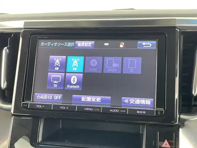 トヨタ アルファード S Cパッケージ 愛知県 2015(平27)年 7.5万km ホワイトパールクリスタルシャイン 禁煙車/純正９インチナビNSZT-W64T/（ＤＶＤ/Bluetooth/フルセグ）/バックカメラ/純正フリップダウンモニター/AC100V電源/トヨタセーフティセンス/・プリクラッシュセーフティ/・レーンディパーチャーアラート/・レーダークルーズコントロール/コーナーセンサー/ETC/ステアリングヒーター/オットマン/パワーシート/メモリシート/両側パワースライドドア/パワーバックドア/純正18インチアルミホイール/LEDヘッドライト/フロントフォグランプ/オートライト/純正フロアマット/スマートキー/プッシュスタート/スペアキー有