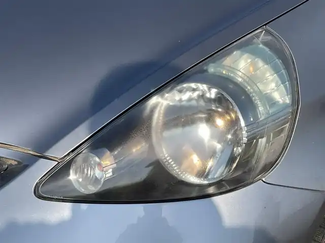 ホンダ フィット 1．3A 新潟県 2005(平17)年 8.5万km ストームシルバーメタリック 4WD/CD/AUX/ETC/リモコンキー /社外14インチアルミホイール/社外14インチAW冬タイヤ車載