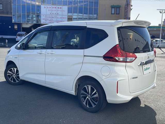 ホンダ フリード ハイブリット G ホンダセンシング 三重県 2017(平29)年 15.7万km ホワイトオーキッドパール 社外7型ナビ/ETC/バックカメラ/追従クルーズコントロール/レーンキープアシスト/前席シートヒーター/ステアリングアシスト/衝突軽減ブレーキ/LEDヘッドライト/LEDルームランプ/禁煙車