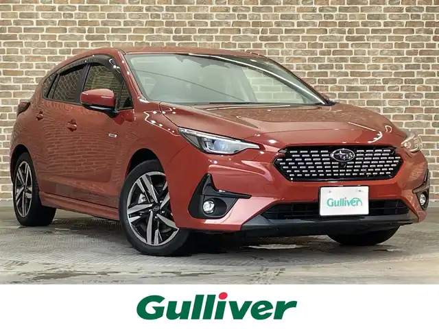 スバル インプレッサ ST－H 岩手県 2023(令5)年 0.2万km オレンジ サンブレイズパール(XAX)/４WD/デジタルマルチビューモニター/アイサイト/プリクラッシュブレーキ/車線逸脱抑制機能/AT誤発進抑制制御/後退時ブレーキアシスト/先行車発進お知らせ機能/青信号お知らせ機能/全車速追従機能付きクルーズコントロール/アクティブレーンキープ/ツーリングアシスト/緊急時プリクラッシュステアリング/スバルリヤビークルディテクション/エマージェンシーレーンキープアシスト/コーナーセンサー/ステアリング連動ヘッドランプ/パドルシフト/オートビークルホールド/SI-DRIVE/ドライバーモニタリングシステム/アダプティブドライビングビーム/１１．６インチナビ/フルセグTV/パワーシート(前席)/シートヒーター(前席)/ステアリングヒーター/LEDヘッドランプ/フロント・リヤフォグランプ/純正１７インチアルミホイール