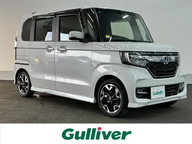 ホンダ Ｎ ＢＯＸ カスタム G L ターボ ホンダセンシング 佐賀県 2019(令1)年 6.4万km プラチナホワイトパール 衝突被害軽減ブレーキ/路外逸脱抑制機能/レーンキープアシスト/先行車発進お知らせ機能/標識認識機能/純正ナビ（VXM-204VFi）/AM/FM/CD/DVD/SD/Bluetooth/USB/フルセグTV/バックカメラ/革巻きステアリング/アダプティブクルーズコントロール/ステアリングスイッチ/パドルシフト/両側電動スライドドア/シートヒーター/ビルトインETC/前方ドライブレコーダー/USB充電/純正アルミホイール/純正フロアマット/リアロールサンシェイド