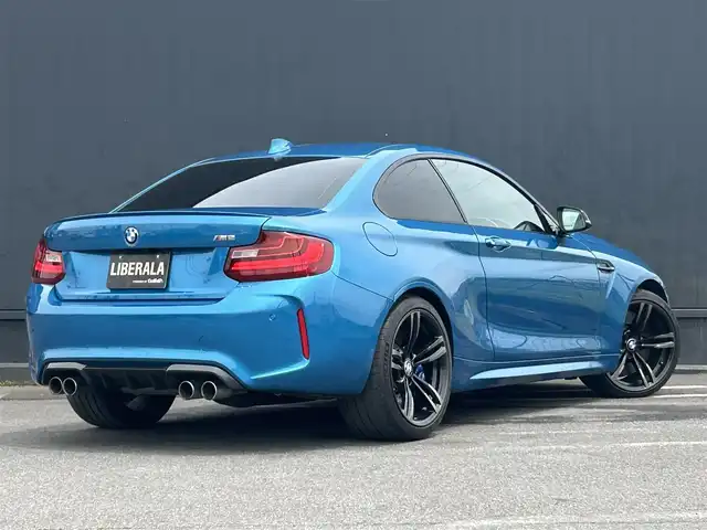 ＢＭＷ Ｍ２ 茨城県 2016(平28)年 3.1万km ロングビーチブルーメタリック コンフォートA/純正HDDナビ/Bカメラ/ミラー一体型ETC/ドラレコ/黒革シート/パワーシート/シートヒーター/クルコン/LKA/純正19インチAW/スマートキー/プッシュスタート
