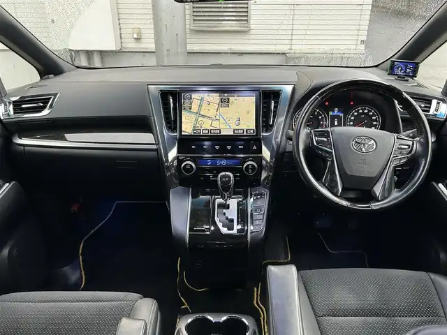 トヨタ ヴェルファイア 2.5Z Aエディデョン ゴールデンアイズ 青森県 2017(平29)年 10.8万km 黒 ・4WD/・純正ディスプレイオーディオ（T-connectoナビ）/・フルセグTV/・BT接続/・バックカメラ/・両側パワースライドドア/・パワーバックドア/・社外デジタルインナーミラー/・プリクラッシュ（衝突被害軽減ブレーキ）/・クルーズコントロール/・オートマチックハイビーム/・LEDオートヘッドライト/・フロントフォグライト/・電動パーキングブレーキ/・ブレーキホールド/・ステアリングスイッチ/・フロントガラスデアイサー/・スマートキー/・ビルトインETC/・クルーズコントロール/・純正18インチAW（235/50R18　22年製造）/・取扱説明書/・スペアキー×2　/・純正エンジンスターターキー