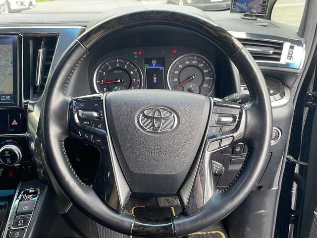トヨタ ヴェルファイア 2.5Z Aエディデョン ゴールデンアイズ 青森県 2017(平29)年 10.8万km 黒 ・4WD/・純正ディスプレイオーディオ（T-connectoナビ）/・フルセグTV/・BT接続/・バックカメラ/・両側パワースライドドア/・パワーバックドア/・社外デジタルインナーミラー/・プリクラッシュ（衝突被害軽減ブレーキ）/・クルーズコントロール/・オートマチックハイビーム/・LEDオートヘッドライト/・フロントフォグライト/・電動パーキングブレーキ/・ブレーキホールド/・ステアリングスイッチ/・フロントガラスデアイサー/・スマートキー/・ビルトインETC/・クルーズコントロール/・純正18インチAW（235/50R18　22年製造）/・取扱説明書/・スペアキー×2　/・純正エンジンスターターキー