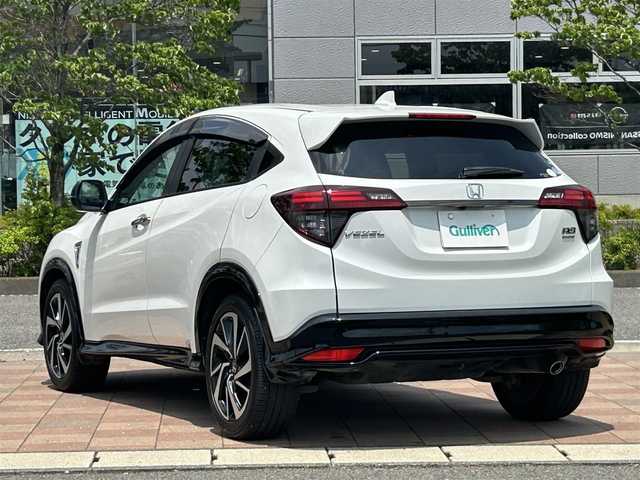 ホンダ ヴェゼル ハイブリッド RS ホンダセンシング 福島県 2020(令2)年 3.4万km プラチナホワイトパール 純正ディスプレイオーディオ/　【ワンセグ/CD/USB/BT】/Honda SENSING/・衝突軽減ブレーキ/・オートハイビーム/・誤発進抑制機能/・後方誤発進抑制機能/・路外逸脱警報機能/・車線維持支援システム/・歩行者事故低減ステアリング/・先行車発進お知らせ機能/・標識認識機能/バックカメラ/ドライブレコーダー前後/ビルトインETC/前席シートヒーター/LEDヘッドライト（AUTO機能付き）/　・フォグランプ/ハーフレザーシート/ステアリングスイッチ/レーダークルーズコントロール/純正フロアマット/ドアバイザー/横滑り防止機能/アイドリングストップ/衝突軽減システム/レーンキープアシスト/パーキングアシスト/ドアバイザー