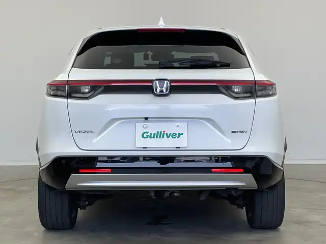 ホンダ ヴェゼル ハイブリッド e:HEV Z 新潟県 2023(令5)年 2.5万km プラチナホワイトパール 純正メモリナビ（Bluetooth・USB・AM・FM）/ハーフレザーシート　/バックカメラ　/フルセグ　/ETC2.0　/衝突被害軽減システム/レーンキープアシスト　/前後コーナーセンサー　/追従クルーズコントロール/前方ドライブレコーダー/LEDオートライト　/オートマチックハイビーム/前席シートヒーター/置くだけ充電　/パーキングアシスト/電動リアゲート/パドルシフト/ヒルディセントコントロール/ステアリングスイッチ/フロントワイパーデアイサー/４WD/純正フロアマット/純正１８インチアルミホイール/スマートキー/スペアキー