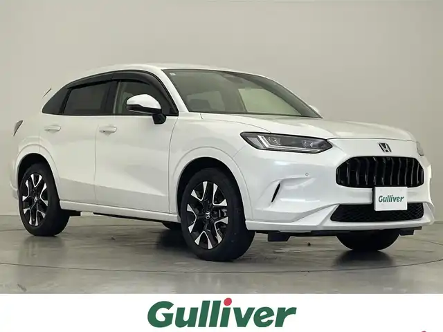ホンダ ＺＲ－Ｖ ハイブリッド e:HEV Z 滋賀県 2023(令5)年 0.7万km プラチナホワイトパール 純正９インチナビ/(Bluetooth/フルセグTV/ラジオ)/ETC2.0/電動格納ミラー/純正前後ドライブレコーダー(SDなし)/全方位カメラ/クリアランスソナー/パワーバックドア/ワイヤレス充電/ステアリングリモコン/シートメモリー/シートヒーター(D/N)/LEDライト/プッシュスタート/純正１８インチアルミホイール