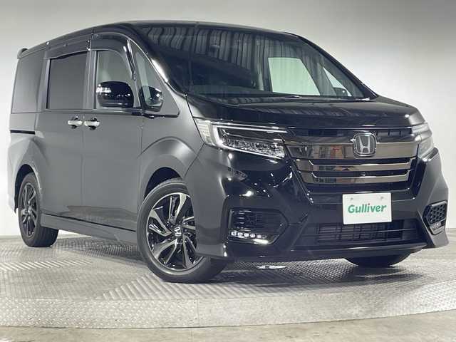 ホンダ ステップワゴン スパーダ クルスピセンシング 山形県 2020(令2)年 2.3万km プレミアムスパークルブラックパール 純正9型メモリーナビゲーション【VXM-227VFNi】/フルセグ　CD DVD　AM FM SD　MUSICRACK　USB　iPod　Bluetooth　/純正後席フリップダウンモニター【VM-185EN】/マルチビューカメラシステム/ブラックスタイル/わくわくゲート/両側電動スライドドア【サンシェード】/ホンダセンシング/CMBS衝突軽減ブレーキ/アダブティブクルーズコントロール/LKAS車線維持支援システム/路外逸脱抑制機能/誤発進抑制機能/先行車発進お知らせ機能/標識認識機能/歩行者事故低減ステアリング/ビルトインETC2.0/純正前後ドライブレコーダー/アイドリングストップ/革巻きステアリング/パドルシフト/プラズマクラスター付きトリプルゾーンオートエアコン/スポーツペダル/超高機能付LED式マップランプ/合皮コンビシート/前席シートバックテーブル/前席シートヒーター/プッシュスタート/スマートキー/LEDヘッドランプ/LEDフロントフォグランプ/オートライト/純正サイド/リアスポイラー/純正17インチアルミホイール/スペアキー