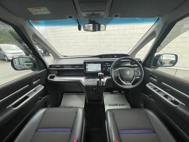 ホンダ ステップワゴン スパーダ クルスピセンシング 山形県 2020(令2)年 2.3万km プレミアムスパークルブラックパール 純正9型メモリーナビゲーション【VXM-227VFNi】/フルセグ　CD DVD　AM FM SD　MUSICRACK　USB　iPod　Bluetooth　/純正後席フリップダウンモニター【VM-185EN】/マルチビューカメラシステム/ブラックスタイル/わくわくゲート/両側電動スライドドア【サンシェード】/ホンダセンシング/CMBS衝突軽減ブレーキ/アダブティブクルーズコントロール/LKAS車線維持支援システム/路外逸脱抑制機能/誤発進抑制機能/先行車発進お知らせ機能/標識認識機能/歩行者事故低減ステアリング/ビルトインETC2.0/純正前後ドライブレコーダー/アイドリングストップ/革巻きステアリング/パドルシフト/プラズマクラスター付きトリプルゾーンオートエアコン/スポーツペダル/超高機能付LED式マップランプ/合皮コンビシート/前席シートバックテーブル/前席シートヒーター/プッシュスタート/スマートキー/LEDヘッドランプ/LEDフロントフォグランプ/オートライト/純正サイド/リアスポイラー/純正17インチアルミホイール/スペアキー