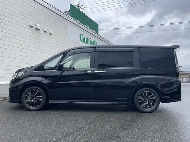 ホンダ ステップワゴン スパーダ クルスピセンシング 山形県 2020(令2)年 2.3万km プレミアムスパークルブラックパール 純正9型メモリーナビゲーション【VXM-227VFNi】/フルセグ　CD DVD　AM FM SD　MUSICRACK　USB　iPod　Bluetooth　/純正後席フリップダウンモニター【VM-185EN】/マルチビューカメラシステム/ブラックスタイル/わくわくゲート/両側電動スライドドア【サンシェード】/ホンダセンシング/CMBS衝突軽減ブレーキ/アダブティブクルーズコントロール/LKAS車線維持支援システム/路外逸脱抑制機能/誤発進抑制機能/先行車発進お知らせ機能/標識認識機能/歩行者事故低減ステアリング/ビルトインETC2.0/純正前後ドライブレコーダー/アイドリングストップ/革巻きステアリング/パドルシフト/プラズマクラスター付きトリプルゾーンオートエアコン/スポーツペダル/超高機能付LED式マップランプ/合皮コンビシート/前席シートバックテーブル/前席シートヒーター/プッシュスタート/スマートキー/LEDヘッドランプ/LEDフロントフォグランプ/オートライト/純正サイド/リアスポイラー/純正17インチアルミホイール/スペアキー