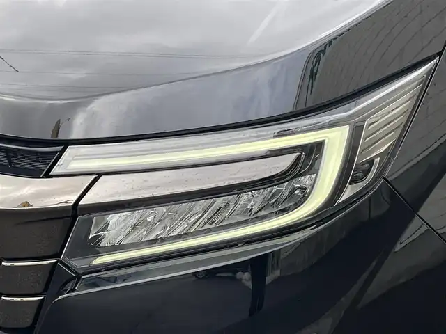 ホンダ ステップワゴン スパーダ クルスピセンシング 山形県 2020(令2)年 2.3万km プレミアムスパークルブラックパール 純正9型メモリーナビゲーション【VXM-227VFNi】/フルセグ　CD DVD　AM FM SD　MUSICRACK　USB　iPod　Bluetooth　/純正後席フリップダウンモニター【VM-185EN】/マルチビューカメラシステム/ブラックスタイル/わくわくゲート/両側電動スライドドア【サンシェード】/ホンダセンシング/CMBS衝突軽減ブレーキ/アダブティブクルーズコントロール/LKAS車線維持支援システム/路外逸脱抑制機能/誤発進抑制機能/先行車発進お知らせ機能/標識認識機能/歩行者事故低減ステアリング/ビルトインETC2.0/純正前後ドライブレコーダー/アイドリングストップ/革巻きステアリング/パドルシフト/プラズマクラスター付きトリプルゾーンオートエアコン/スポーツペダル/超高機能付LED式マップランプ/合皮コンビシート/前席シートバックテーブル/前席シートヒーター/プッシュスタート/スマートキー/LEDヘッドランプ/LEDフロントフォグランプ/オートライト/純正サイド/リアスポイラー/純正17インチアルミホイール/スペアキー